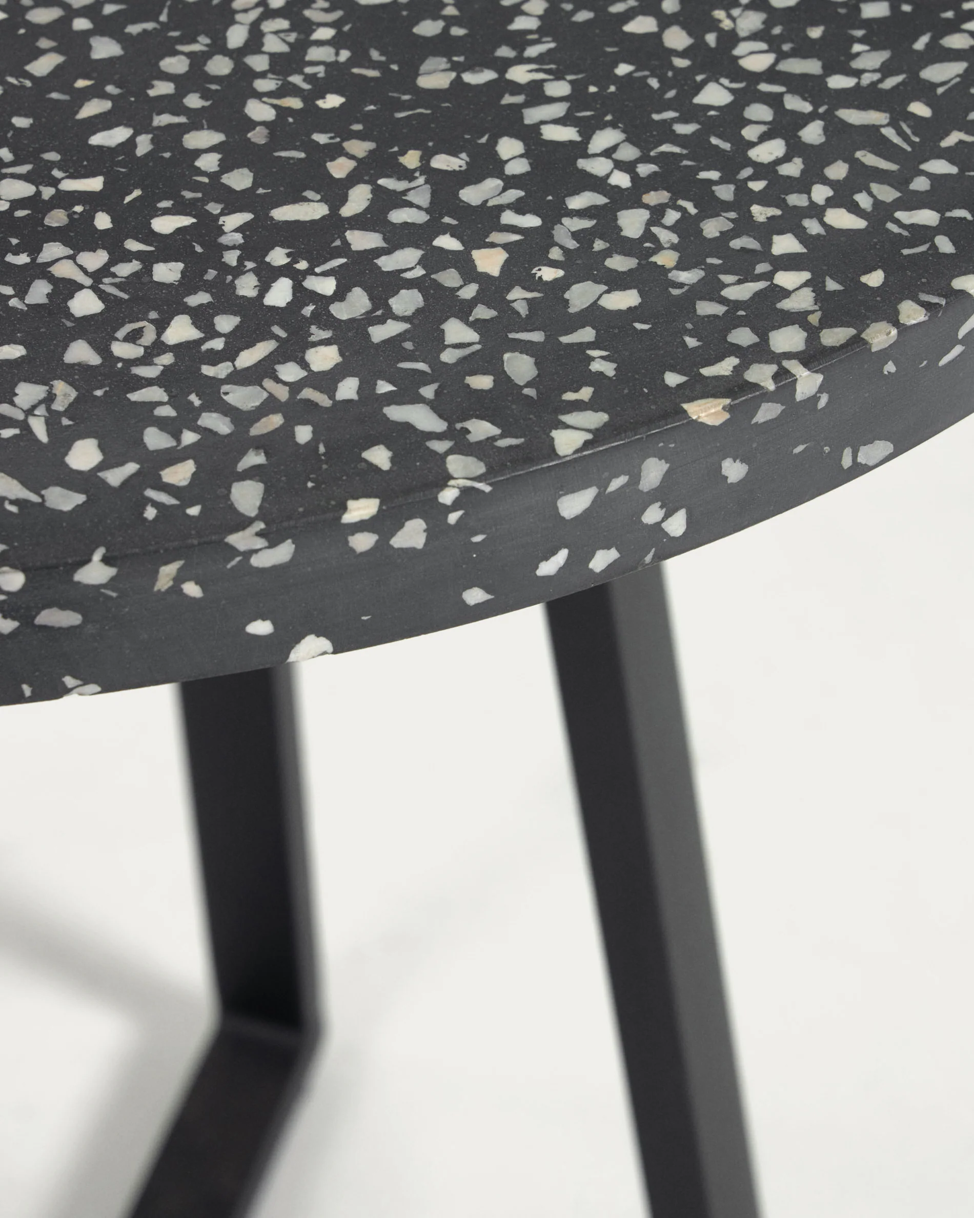 Tella round terrazzo table in black with steel legs, Ø 70 cm - Image 3